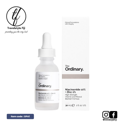 The image shows a product packaging and bottle for The Ordinary skincare products. The packaging is predominantly white with text and branding, and the bottle is a clear dropper bottle containing the skincare product.
