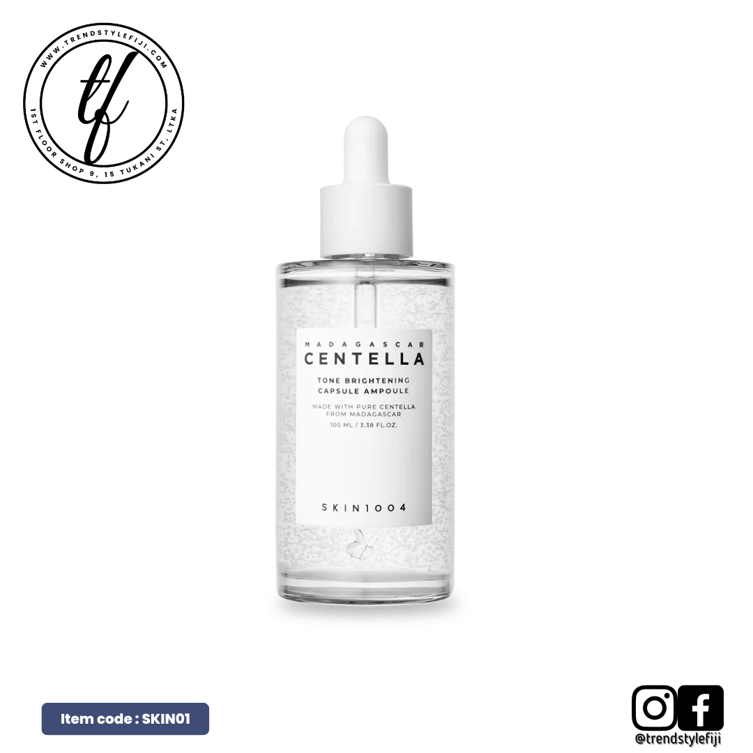 A clear glass bottle with a white dropper containing a skin care ampoule. The label reads 'SKIN1004 CENTELLA ASIATICA Ampoule'.